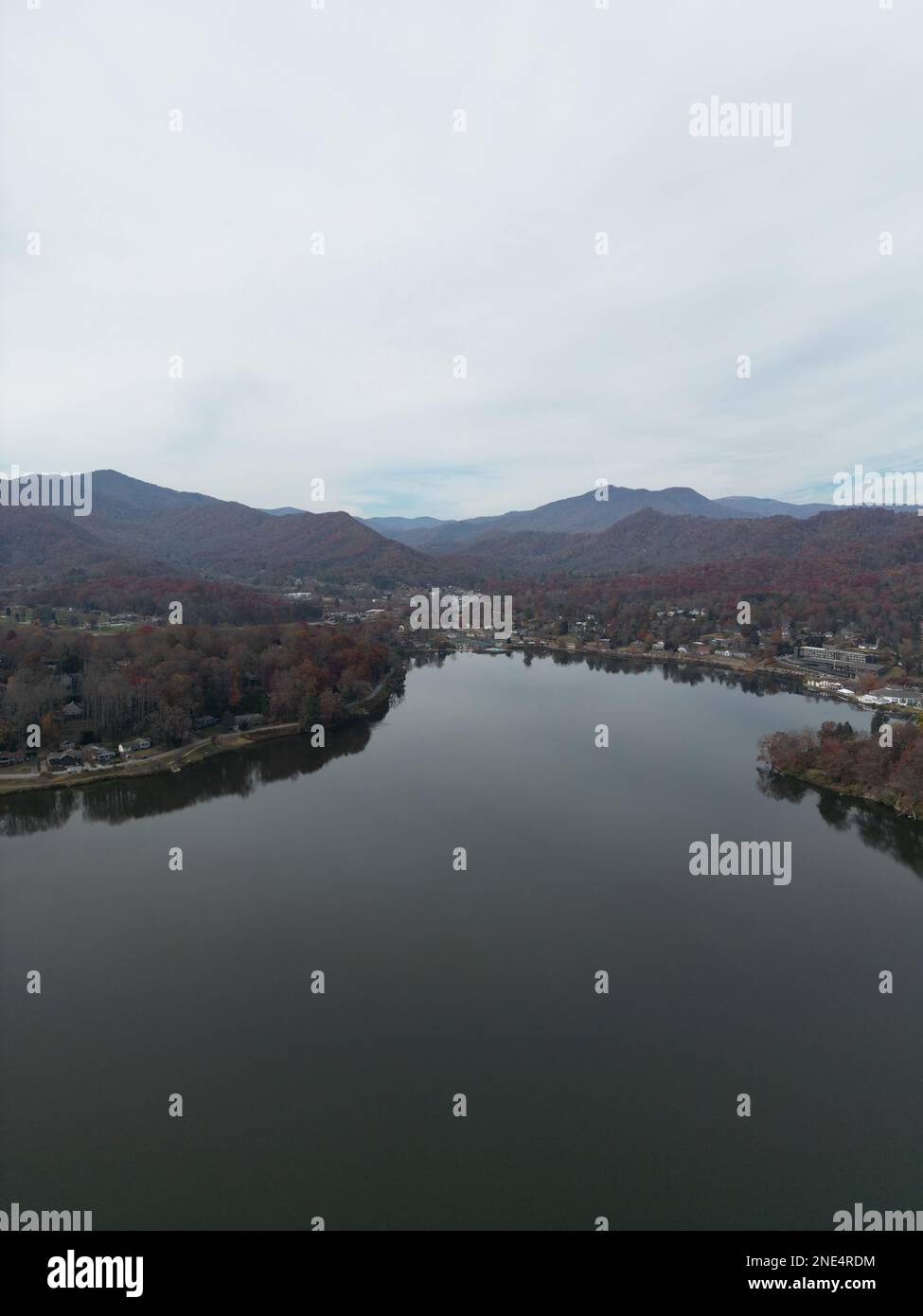 An aerial view of Lake Junaluska and forest mountain in Waynesville