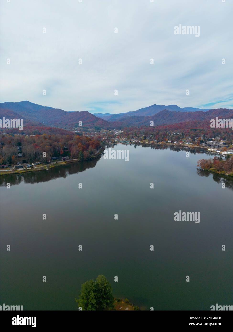 An aerial view of Lake Junaluska and forest mountain in Waynesville