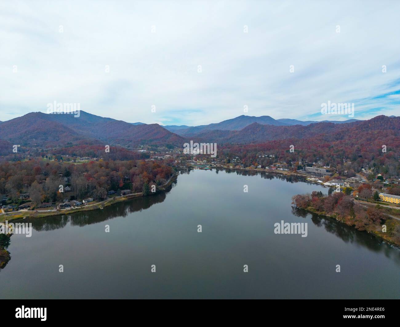 An aerial view of Lake Junaluska and forest mountain in Waynesville