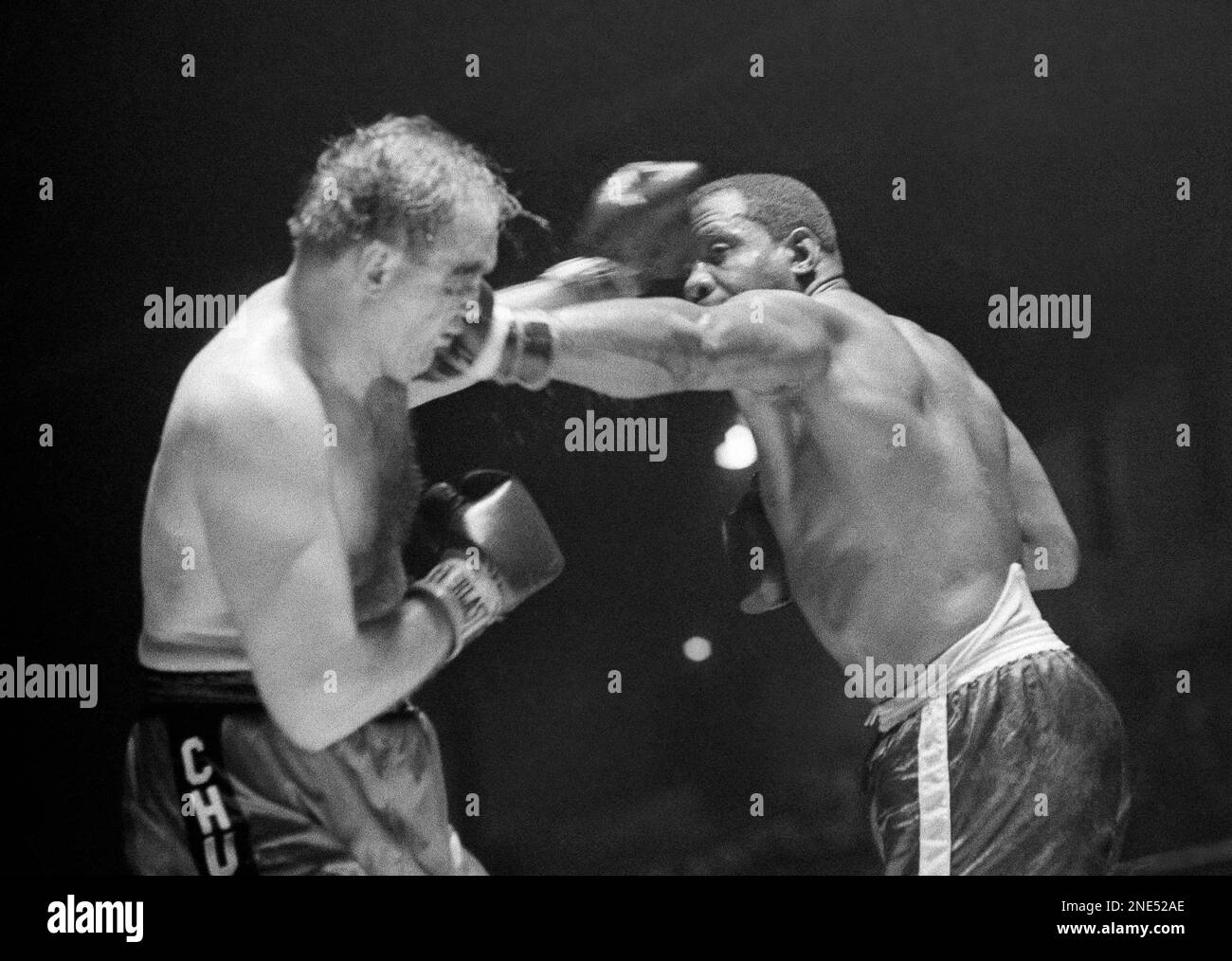 Former heavyweight champion Sonny Liston, right, lands a