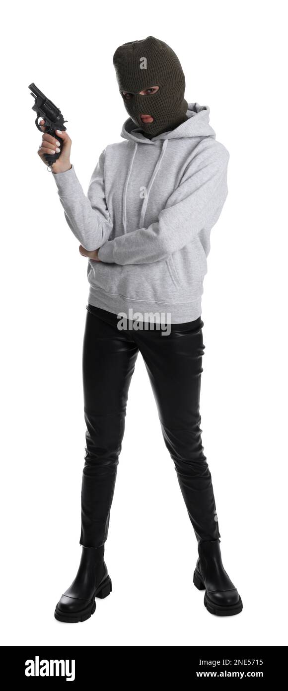 Woman wearing knitted balaclava with gun on white background Stock