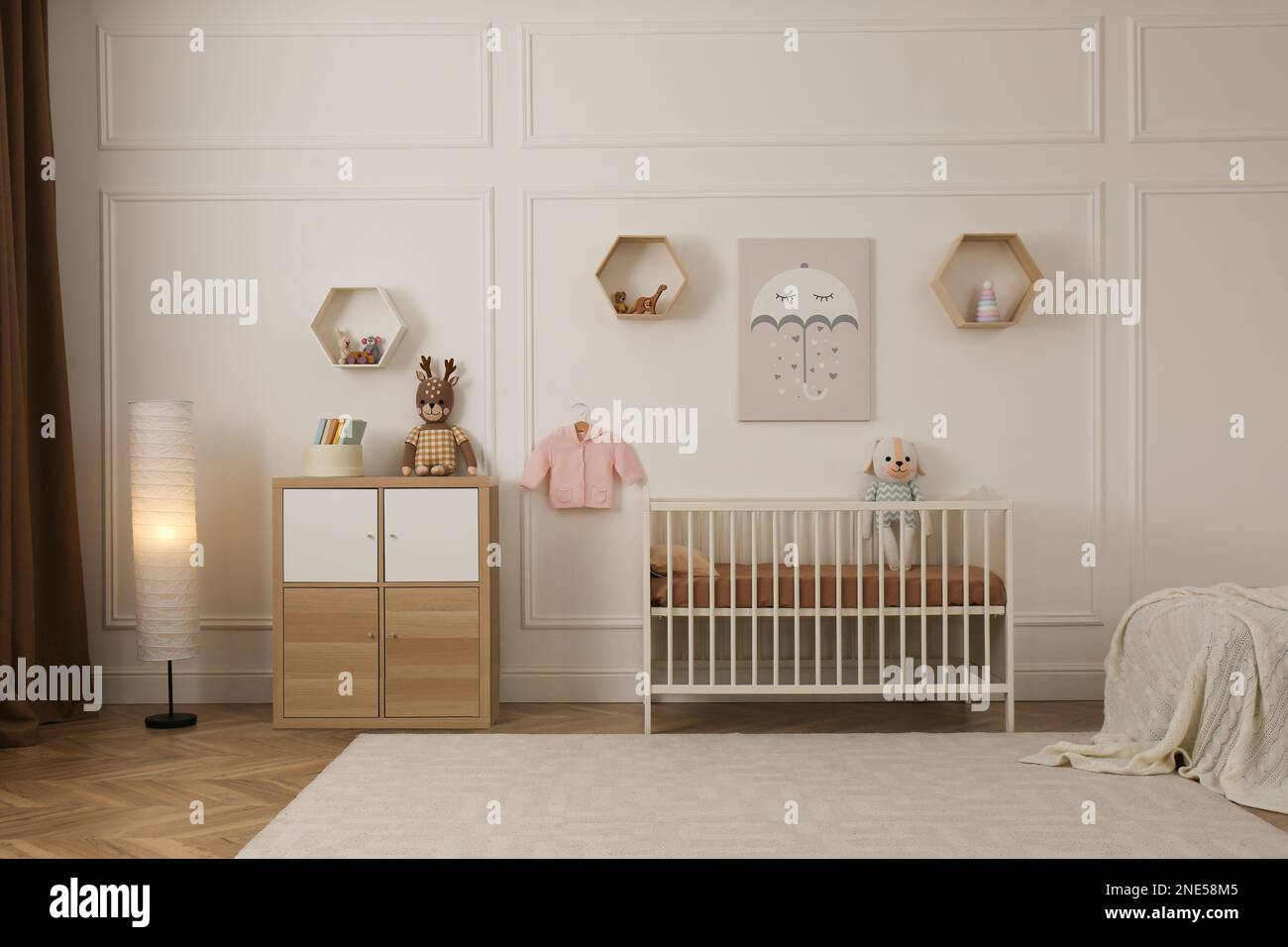 Modern baby room interior with stylish furniture and toys Stock Photo ...