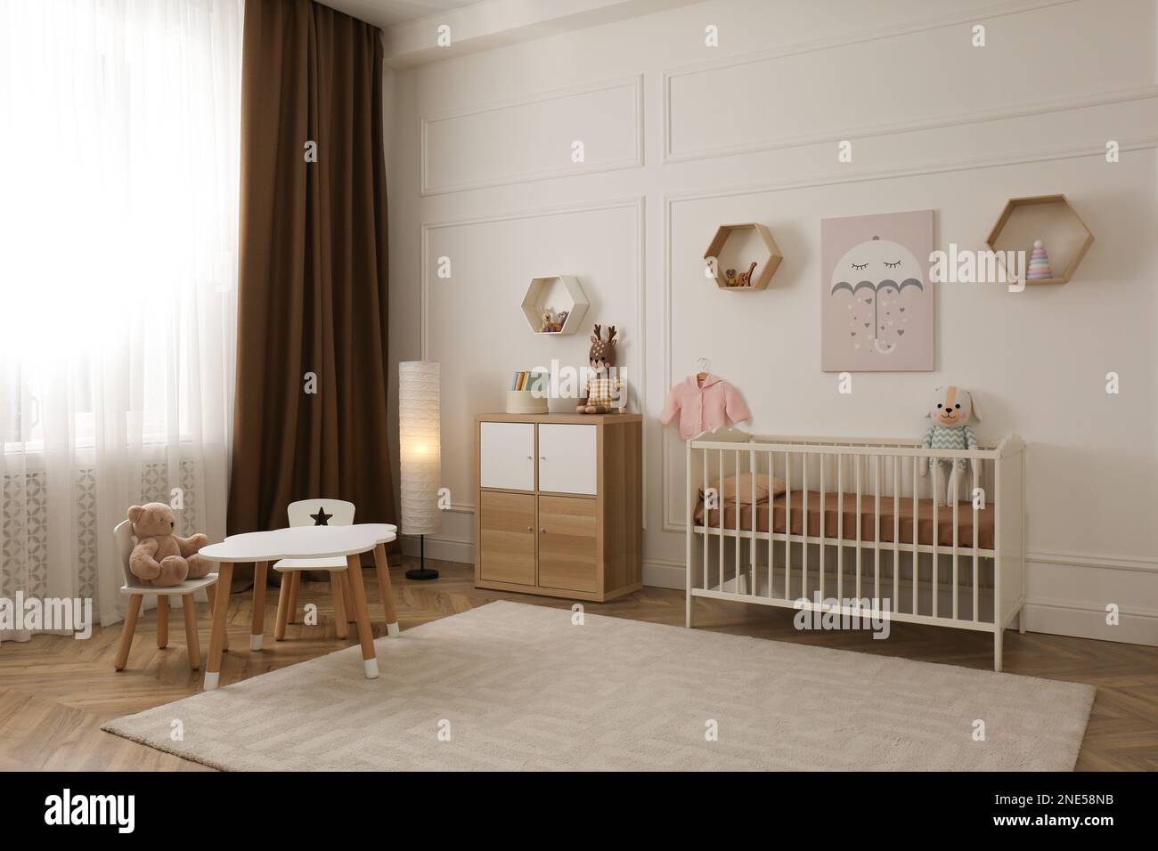 Modern baby room interior with stylish furniture and toys Stock Photo ...