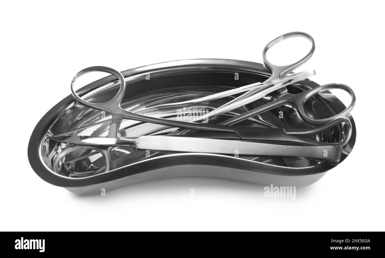 Surgical instruments in kidney dish on white background Stock Photo