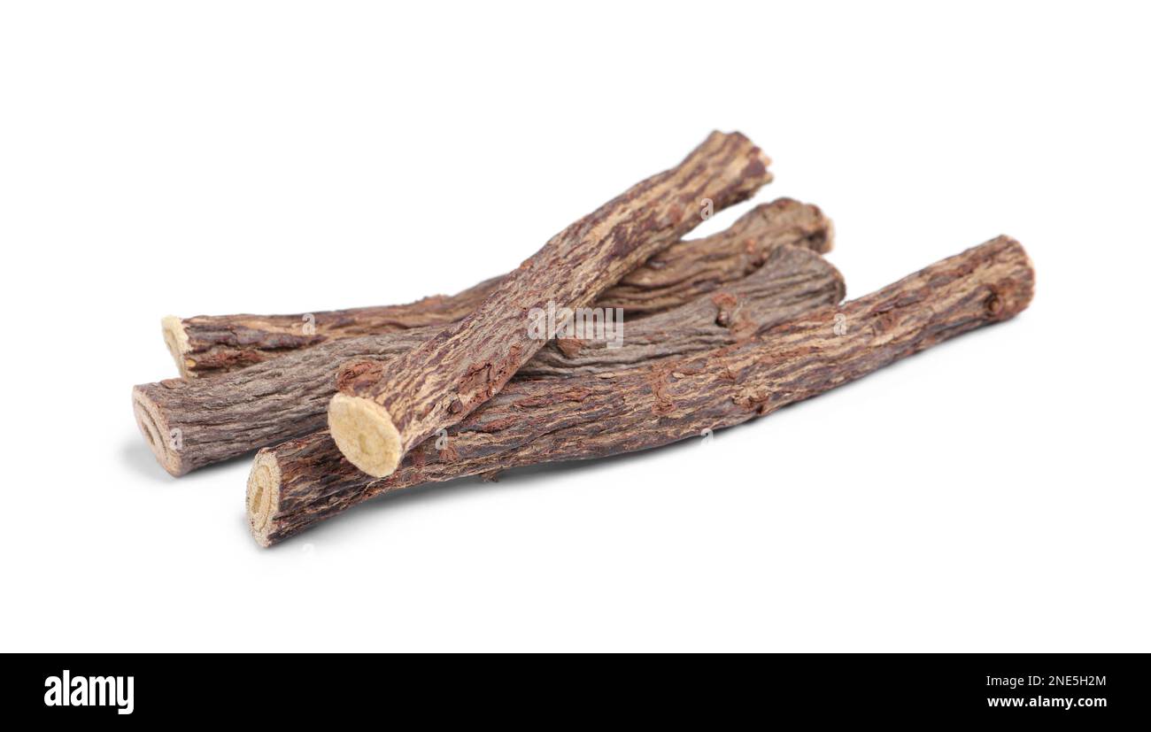 Dried sticks of liquorice root on white background Stock Photo