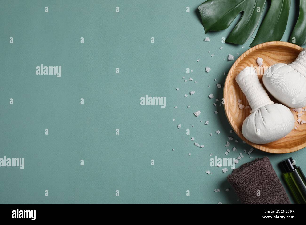 Flat lay composition with spa items on pale green background, space for text Stock Photo