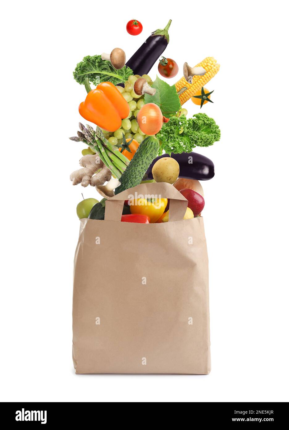 Paper bag with vegetables and fruits on white background. Vegetarian