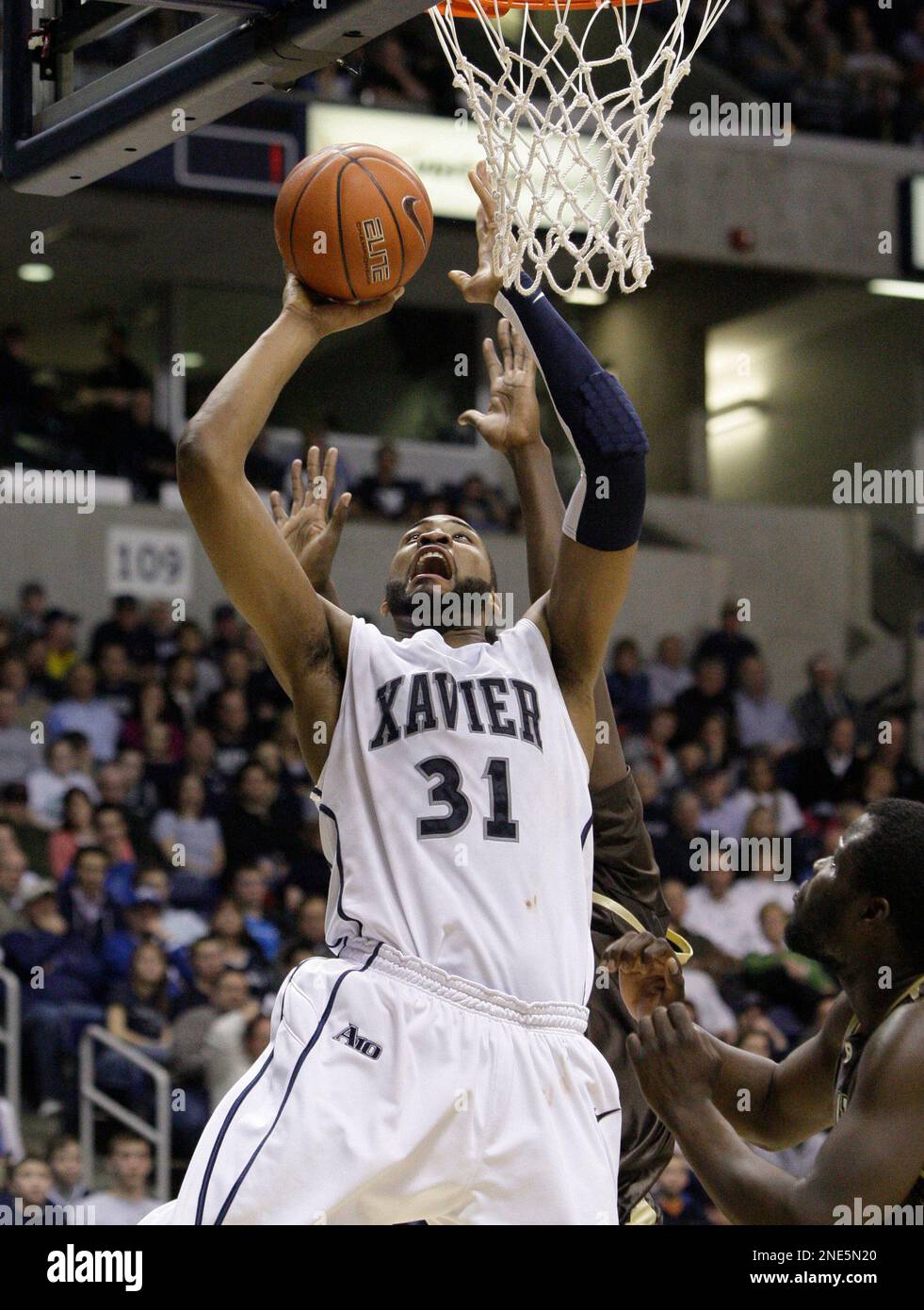 Xavier forward Jason Love (31) shoots against St. Bonaventure in the