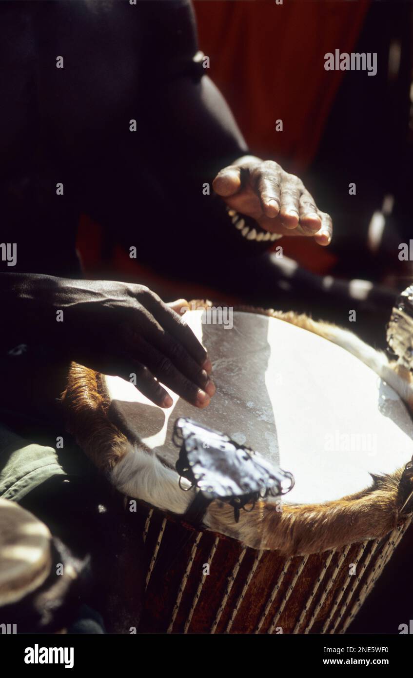 Gambia, Sanyang Beach, locals playing the drums Stock Photo Alamy
