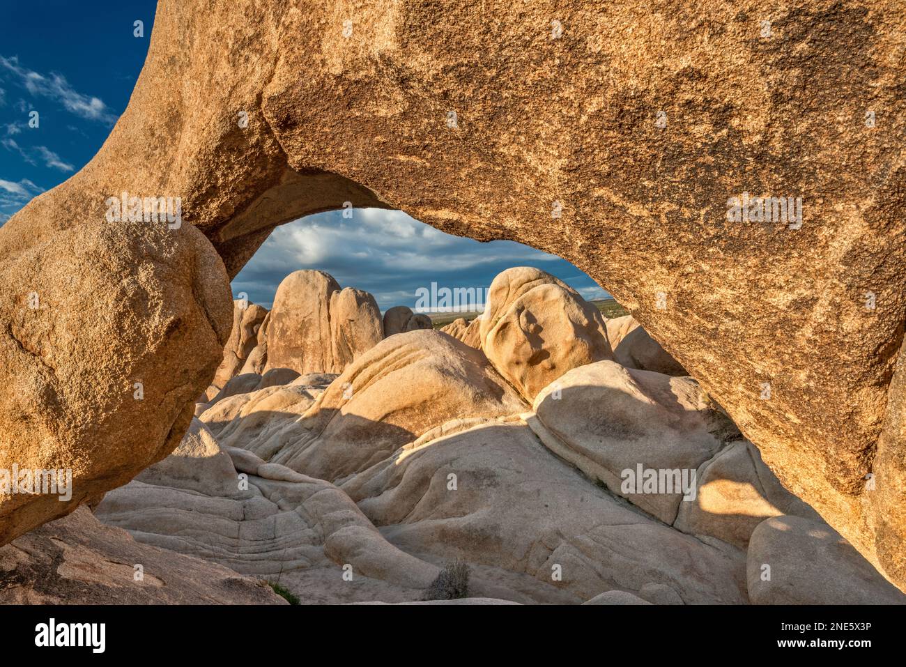 Arch Rock, granite rock near White Tank Campground, at sunrise, Mojave