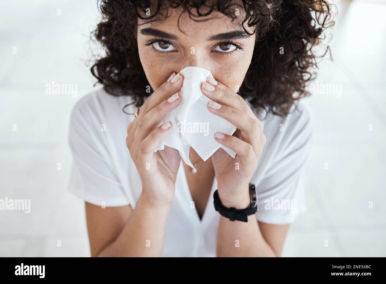 Black woman, tissue and blowing nose in home for portrait with