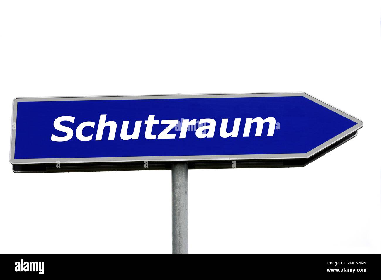 blue signpost lettering Schutzraum, safe room Stock Photo