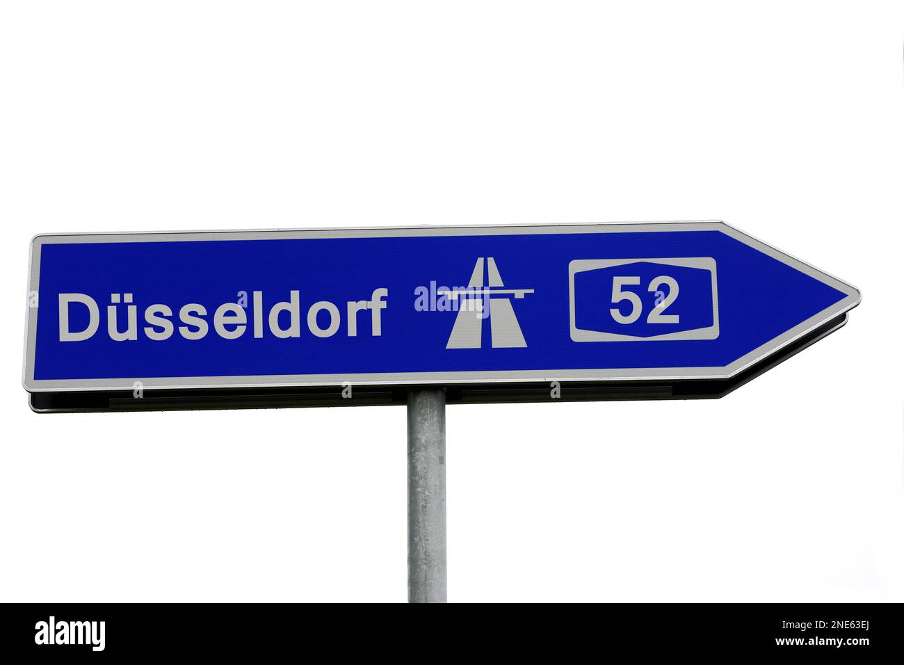 Signpost to the A52 motorway towards Duesseldorf Stock Photo