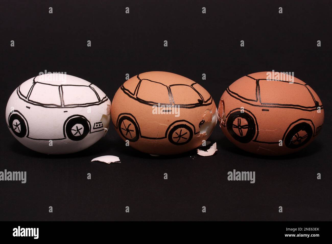 chicken eggs painted as cars, car accident Stock Photo Alamy