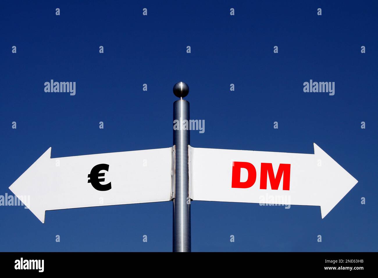 signposts pointing in different directions, options Euro - DM Deutsche Mark Stock Photo