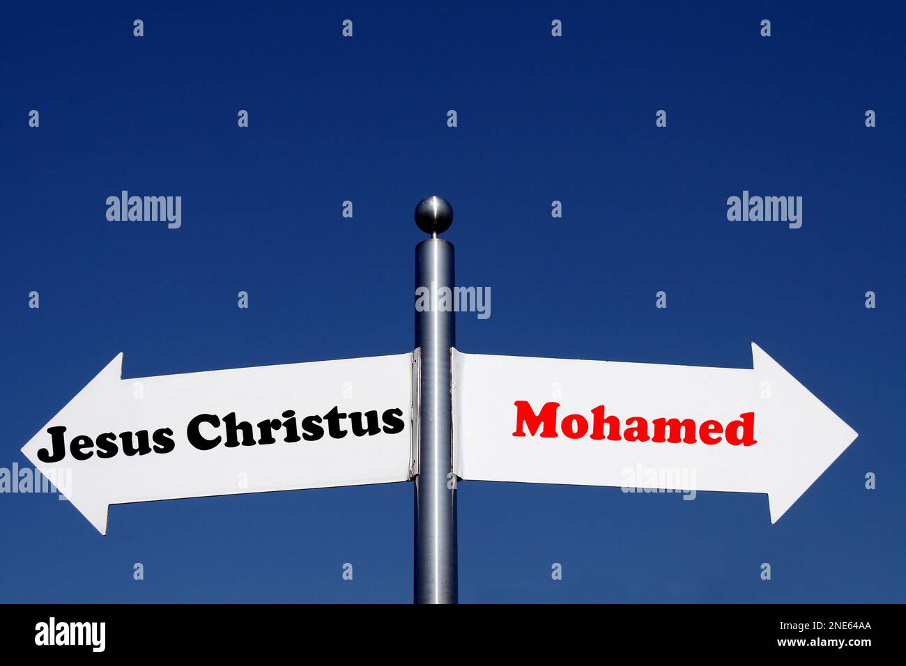 signposts pointing in different directions, options Jesus Christ - Mohamed Stock Photo