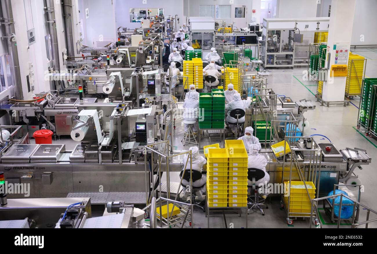 Penang, Malaysia. 16th Feb, 2023. Employees in protective suits sit in a  production facility of the German medical technology company B. Braun. The  medical technology manufacturer B. Braun is the largest producer
