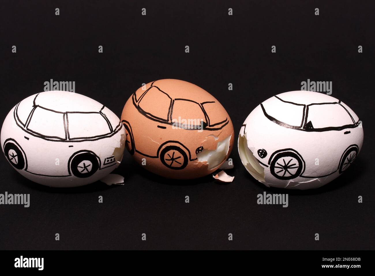 chicken eggs painted as cars, car accident Stock Photo Alamy