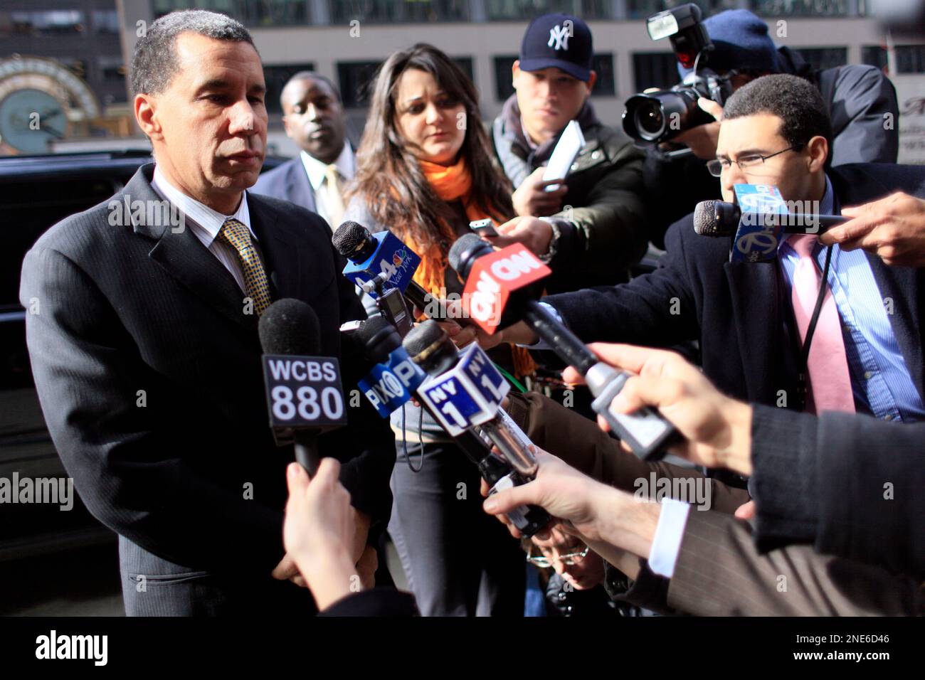 New York Gov. David Paterson speaks to reporters as he arrives at his ...