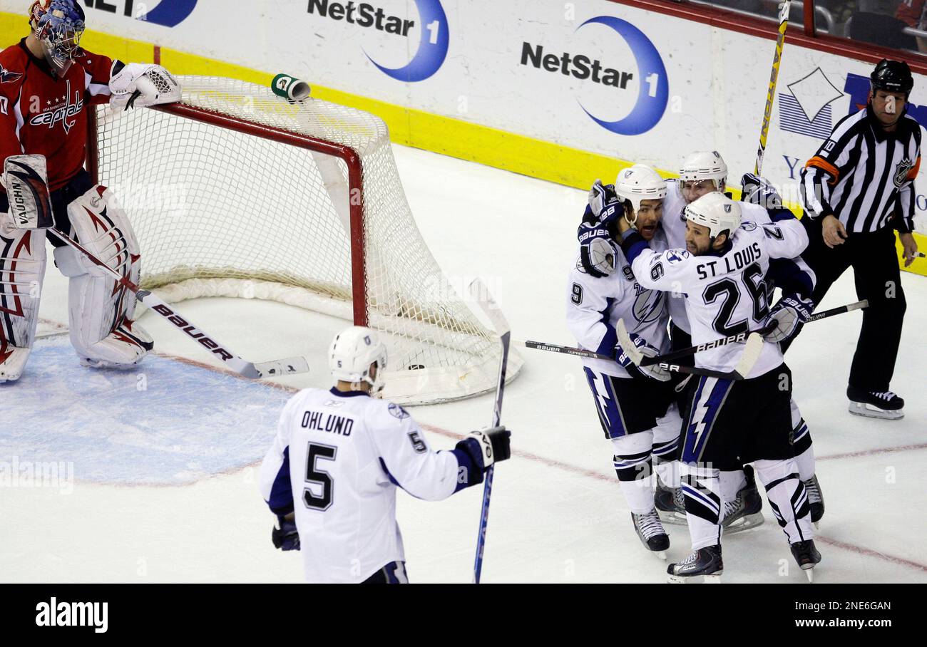 Tampa Bay Lightning center Steven Stamkos (91) celebrates his game-winning  goal in overtime of an NHL hockey game against the Washington Capitals,  Saturday, Oct. 16, 2021, in Washington. The Lightning won 2-1. (