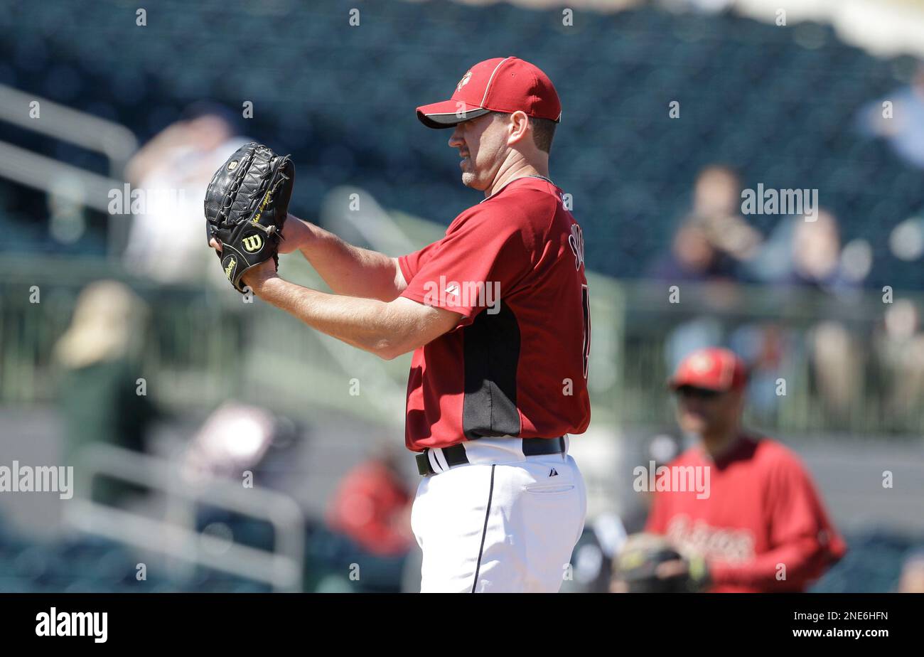 Houston Astros pitcher Chris Sampson walks to the dugout after