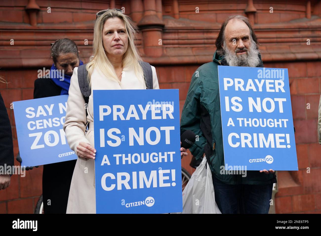 Supporters of Father Sean Gough, a Catholic priest of the Archdiocese of Birmingham, and Isabel Vaughan-Spruce at Birmingham Magistrates' Court where they are accused of protesting outside an abortion clinic inside a Birmingham abortion facility censorship zone. Picture date: Thursday February 16, 2023. Stock Photo