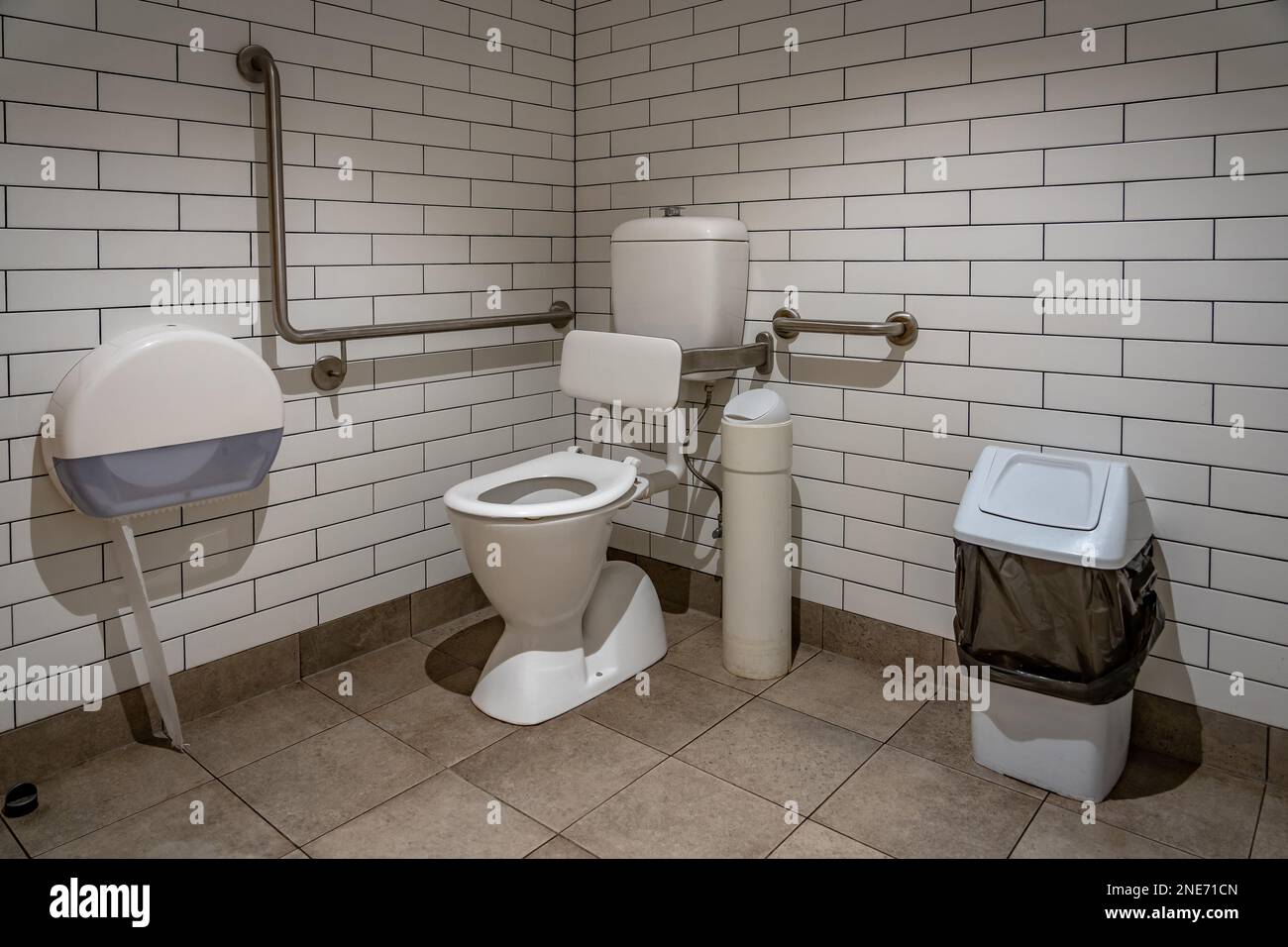 Unisex disabled toilet suite room Stock Photo Alamy