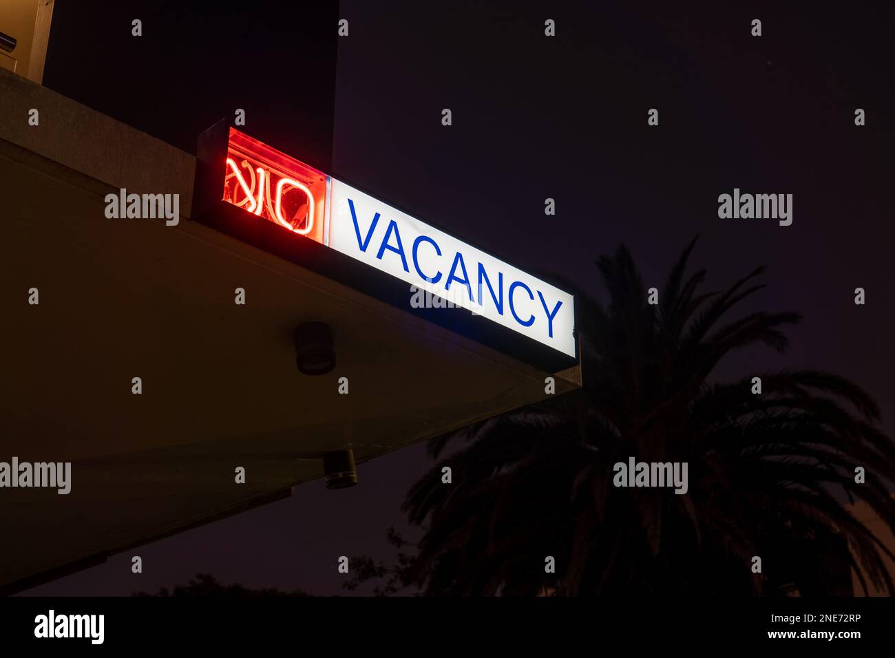 Illuminated neon No Vacancy sign Stock Photo