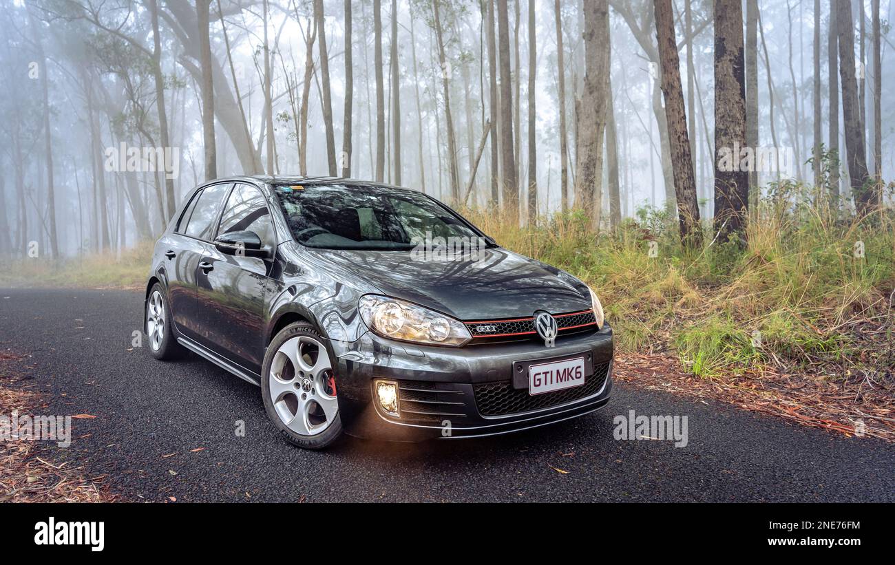 New South Whales, Australia - Volkswagen Golf GTI MKVI parked in a foggy forest Stock Photo
