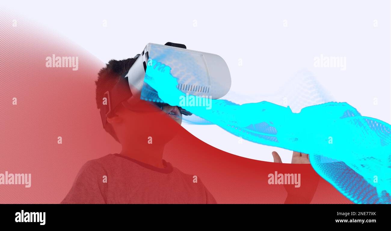 Composition of digital light trails with boy wearing vr headset Stock ...