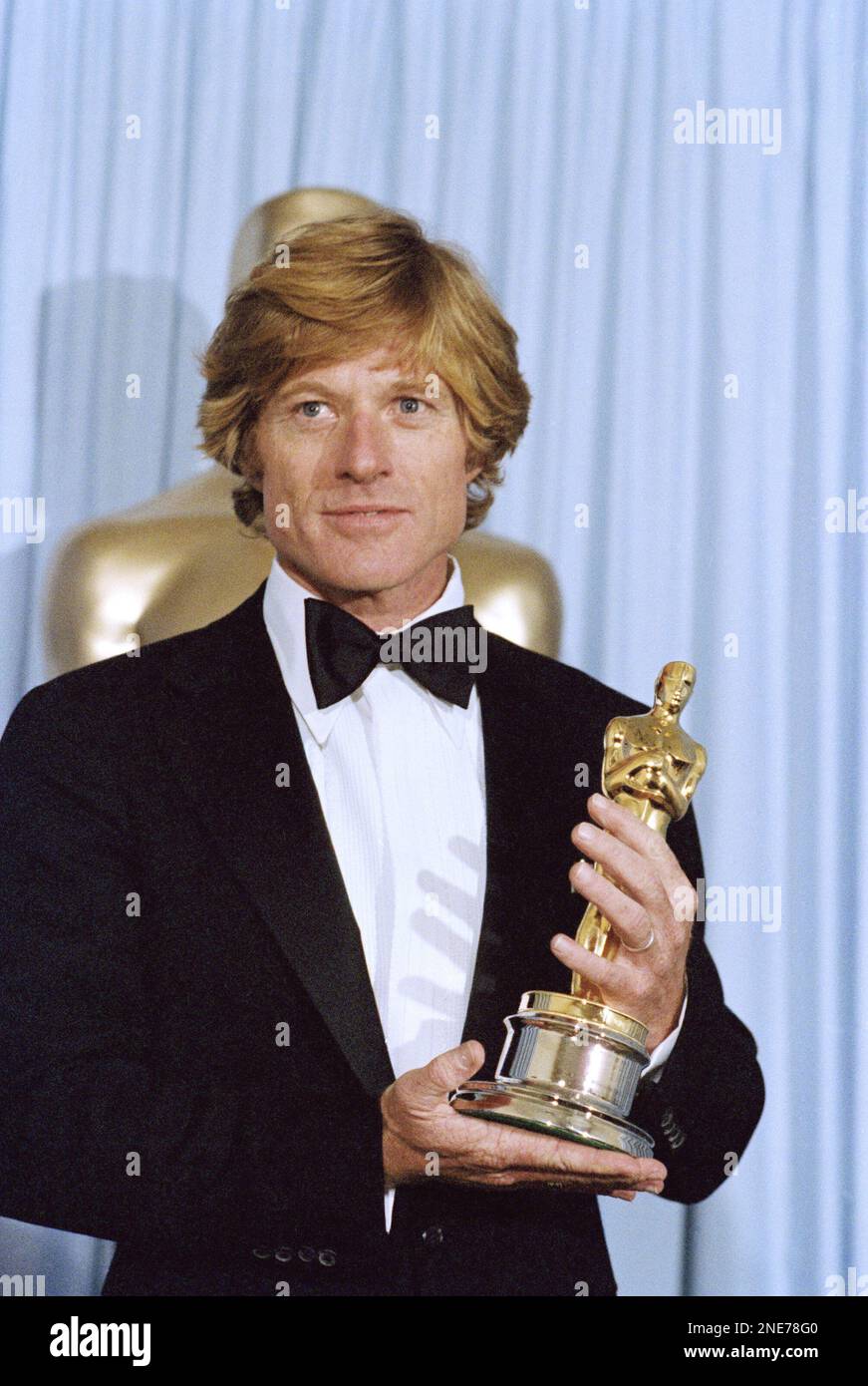 Actor Robert Redford holding Oscar he won for best director ?Ordinary