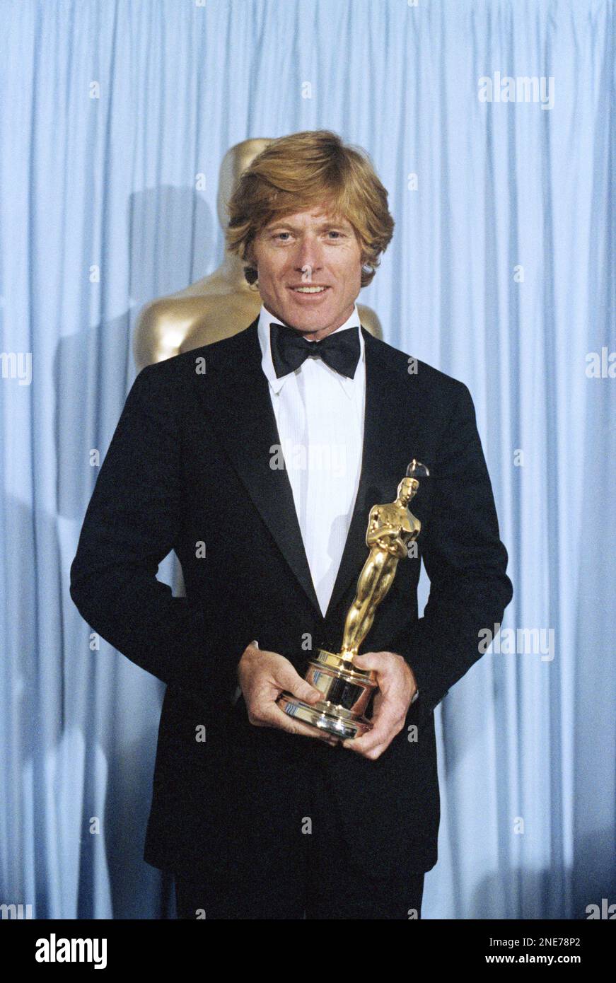 Actor Robert Redford holding Oscar he won for best director ?Ordinary