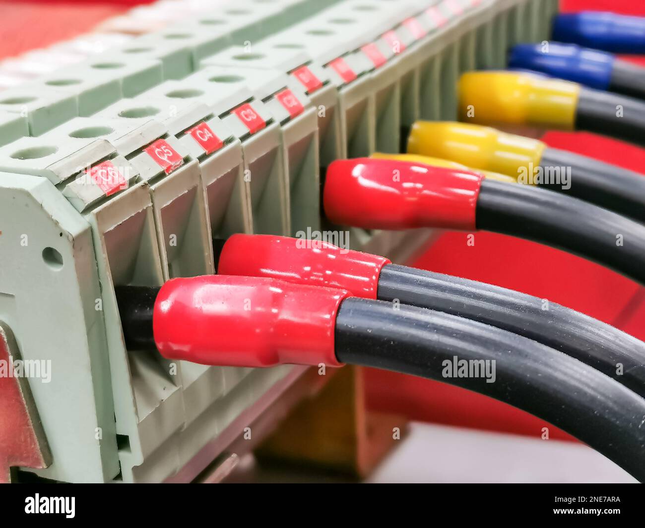 Close up image of cable distribution connection on electrical equipment