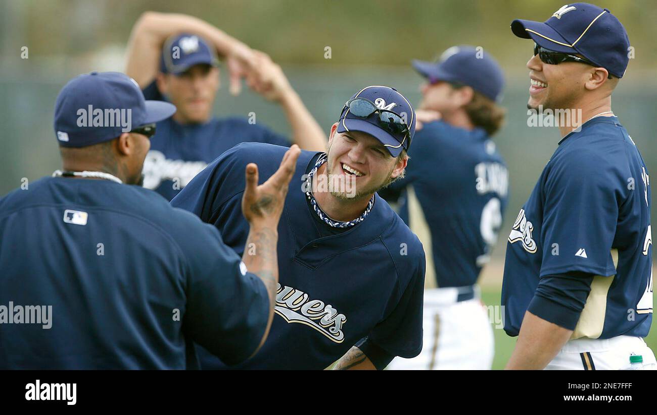 Milwaukee Brewers players Corey Hart, center, and Jody Gerut, right