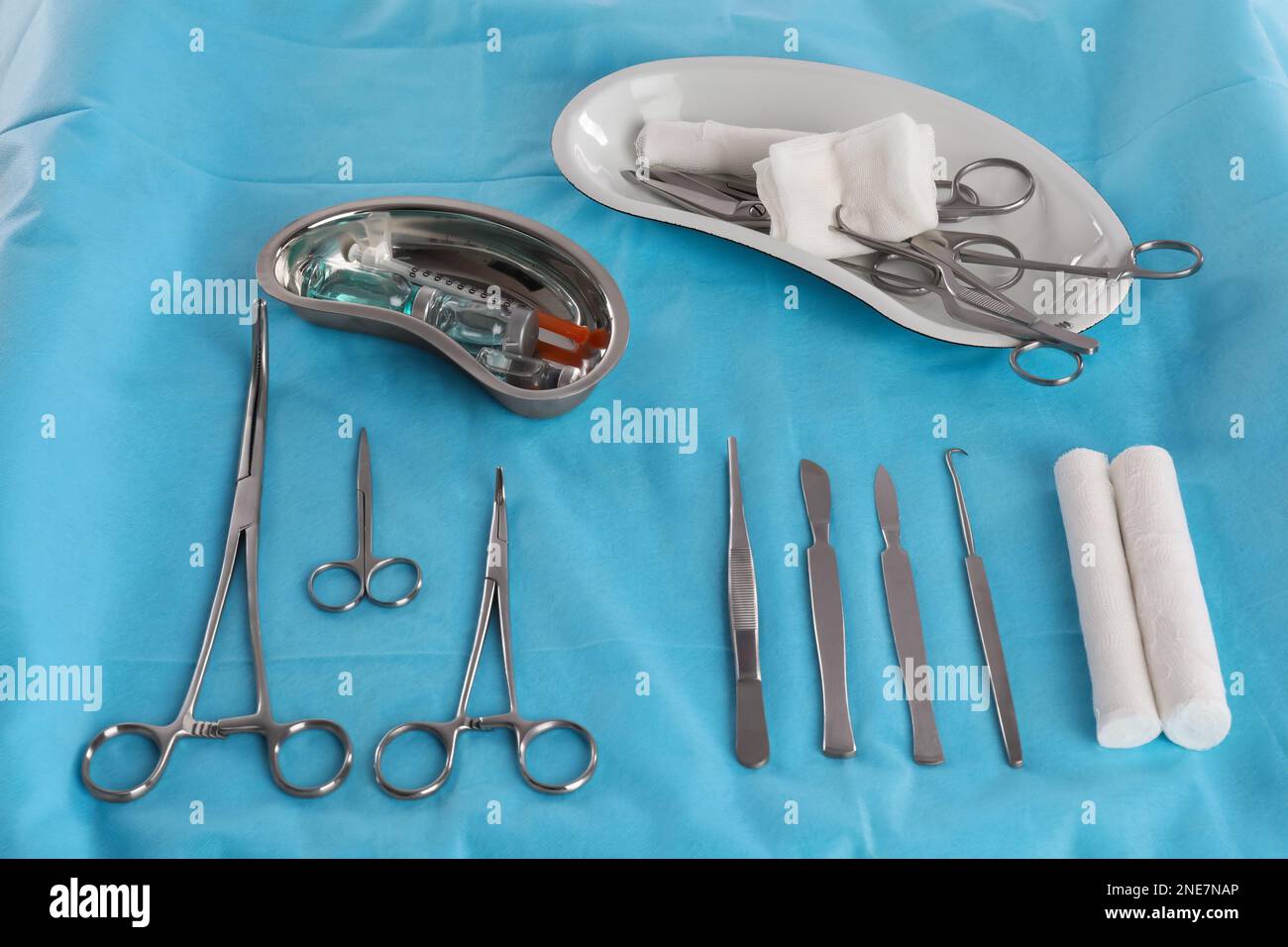 Set of different surgical instruments on table Stock Photo