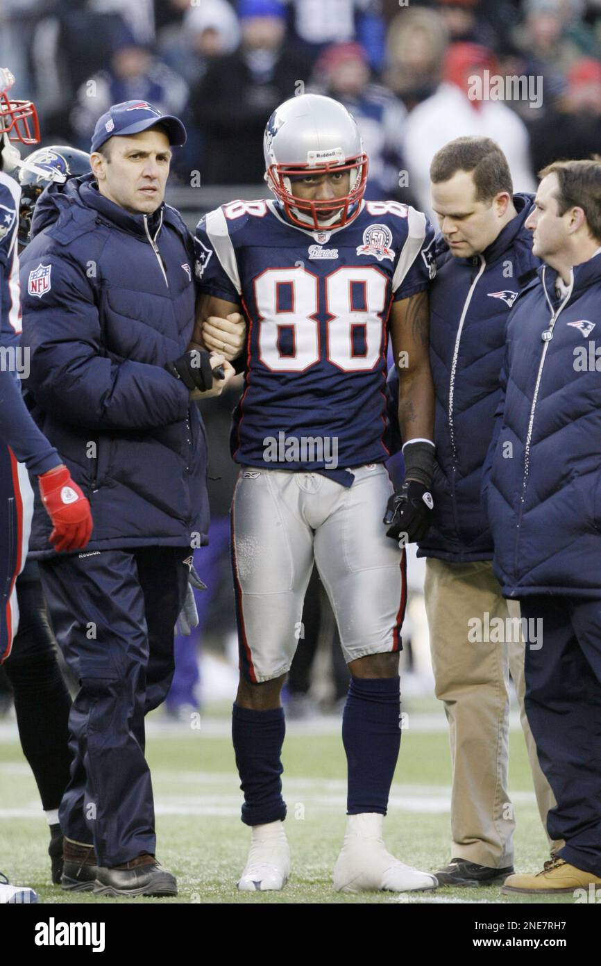 New England Patriots wide receiver Sam Aiken (88) is helped off the field  during an NFL wild-card playoff football game in Foxborough, Mass., Sunday,  Jan. 10, 2010. The Ravens beat the Patriots