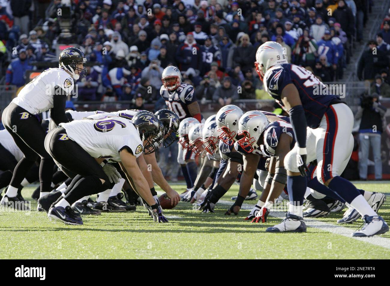 The New England Patriots and the Baltimore Ravens line up at the line of  scrimmage for the snap during an NFL football game at Gillette Stadium,  Sunday, Sunday, Sept. 24, 2022 in