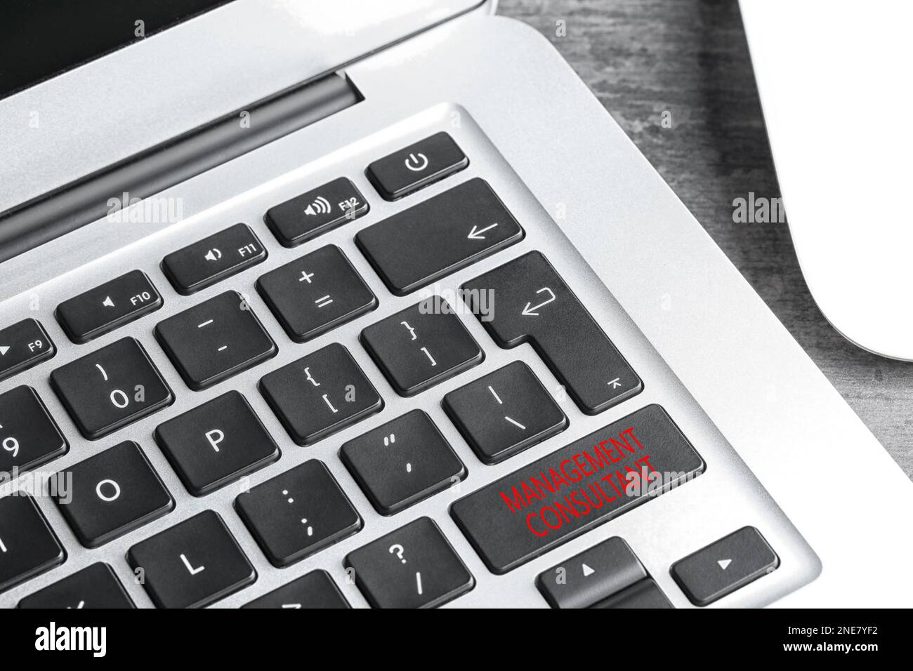 Button with text MANAGEMENT CONSULTANT on keyboard, closeup Stock Photo