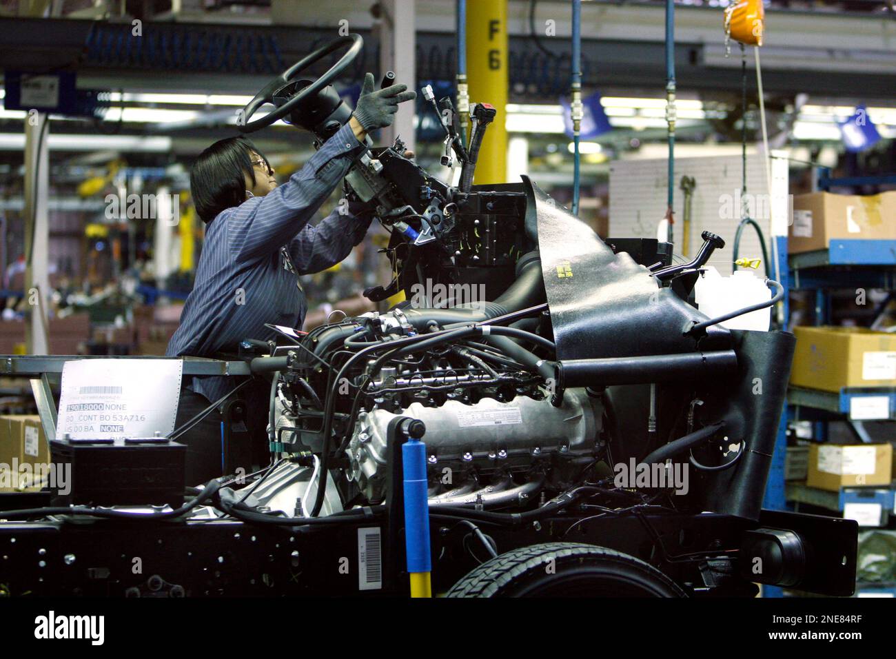 In this photo made Feb. 8, 2010, Detroit Chassis assembly line worker