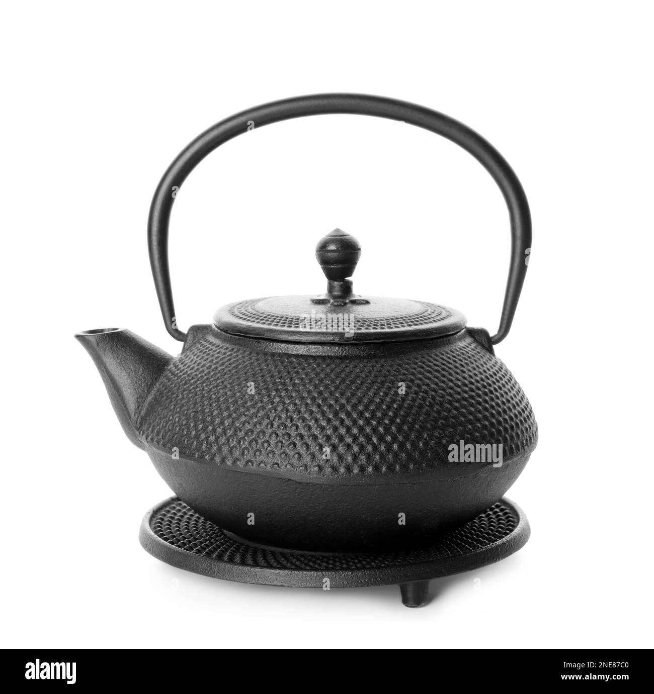 Black teapot with stand isolated on white Stock Photo Alamy