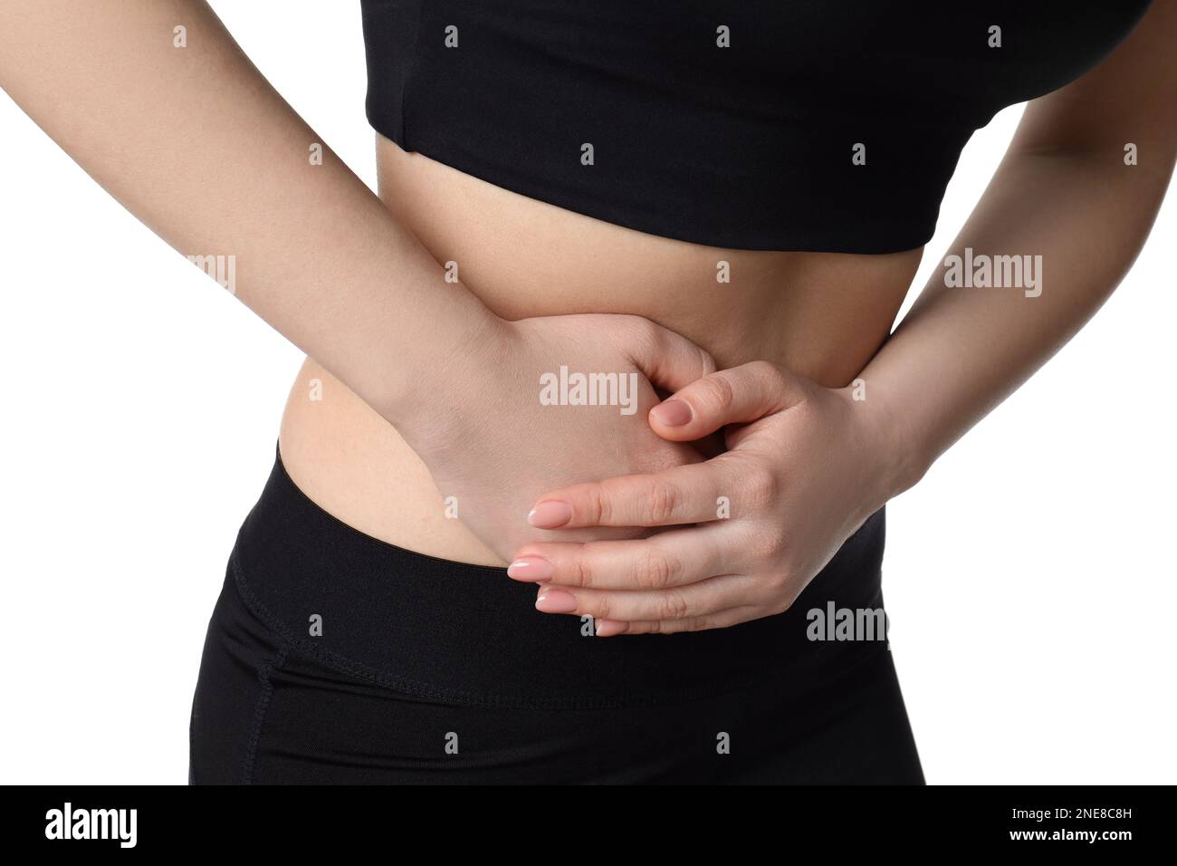 Woman suffering from pain in lower right abdomen on white background