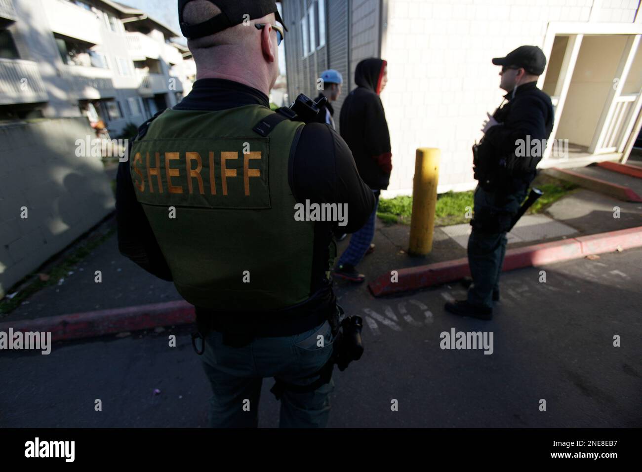 Snohomish County Sheriff's deputy Bud McCurry, left, and Mike Woodruff