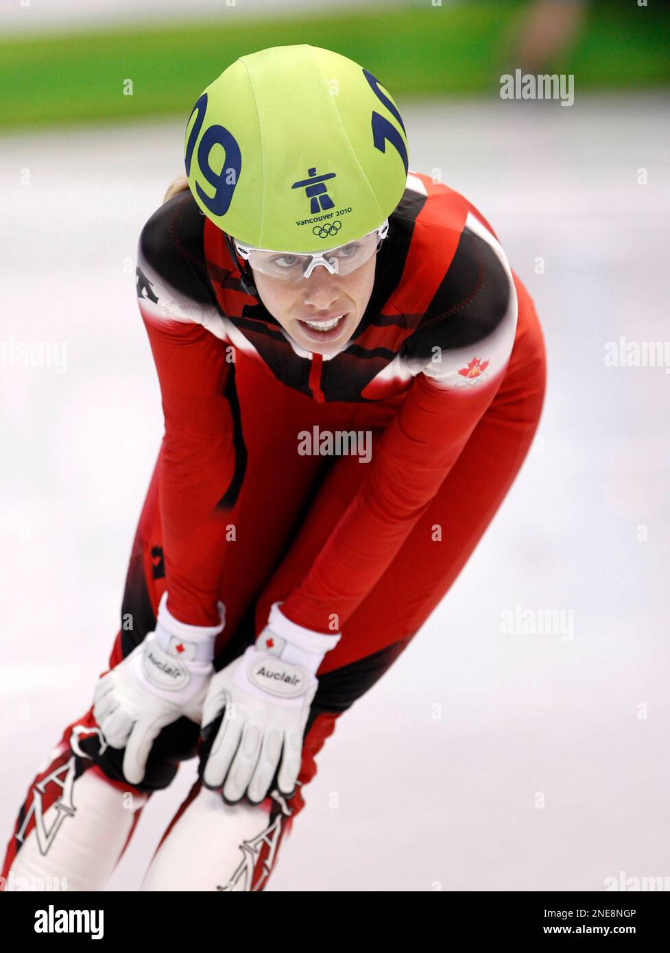 Canada's Tania Vicent catches her breath following the women's