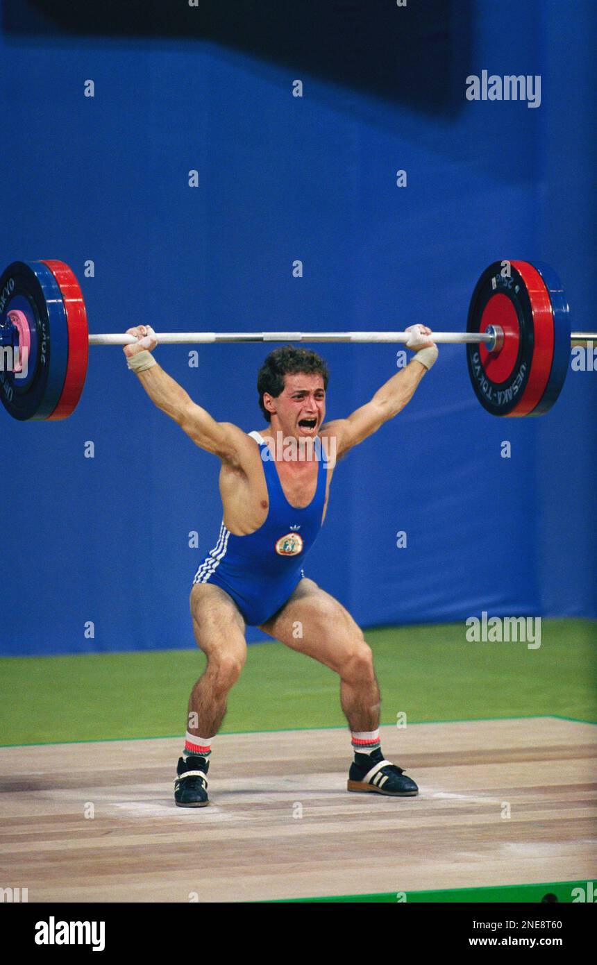 Barbell holding smiling sport strength the olympic games winning hires