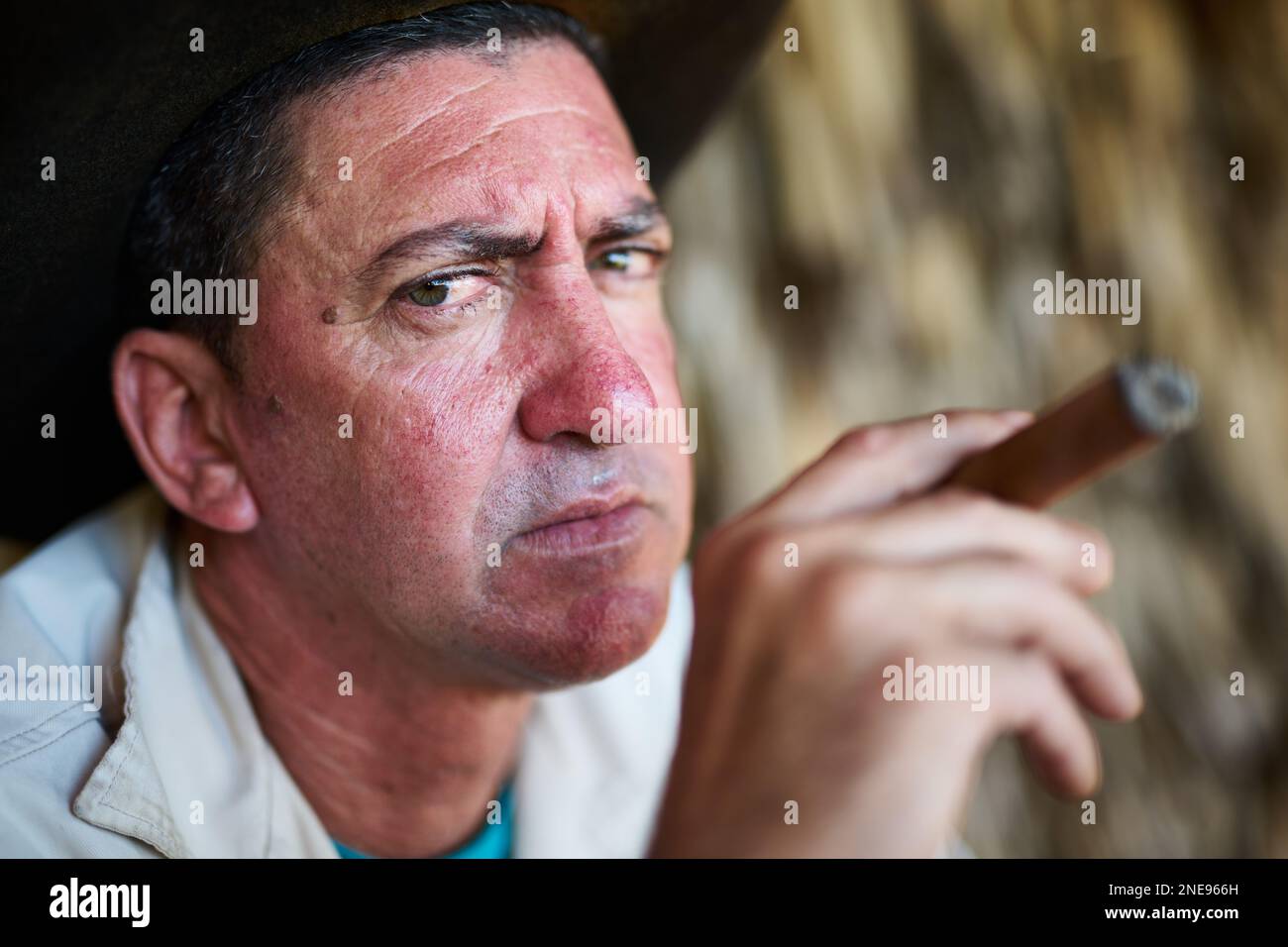 Cowboy smoking cigar hi-res stock photography and images