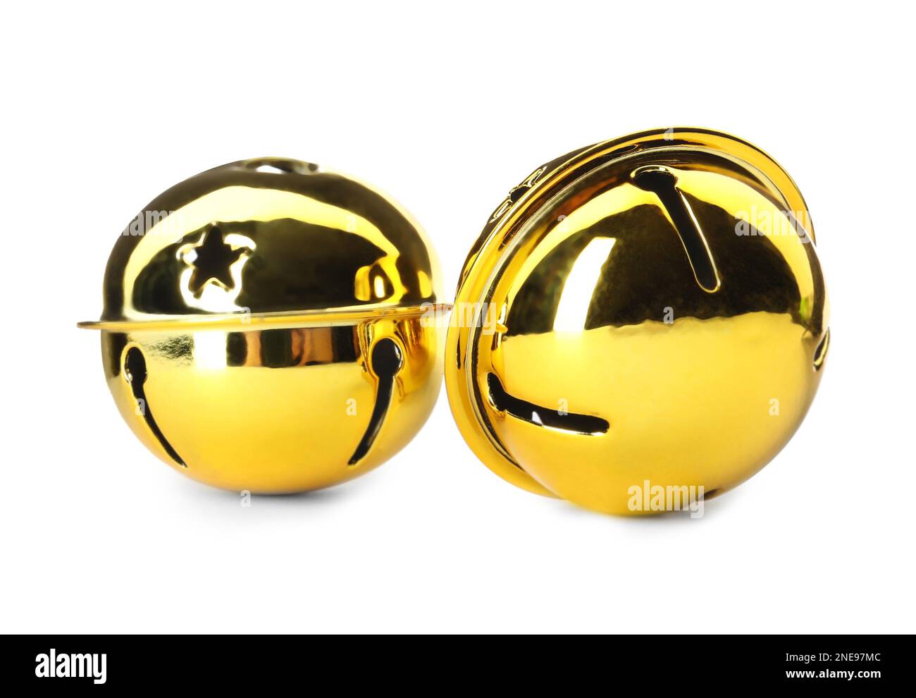 Shiny golden sleigh bells on white background Stock Photo Alamy