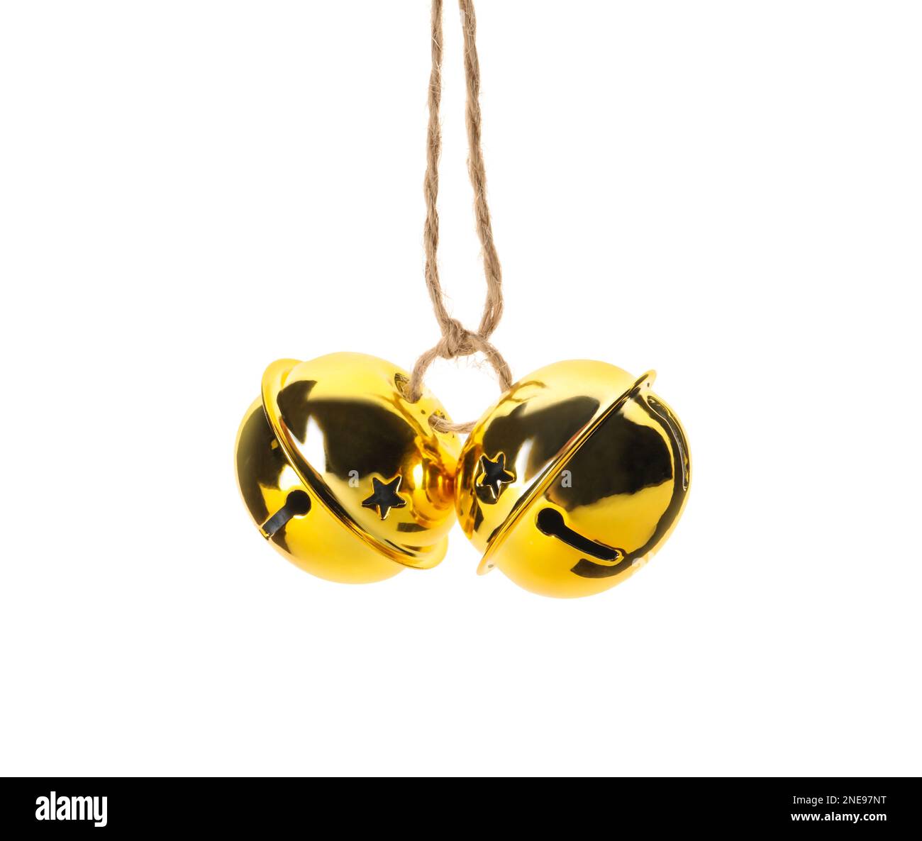 Shiny golden sleigh bells on white background Stock Photo - Alamy