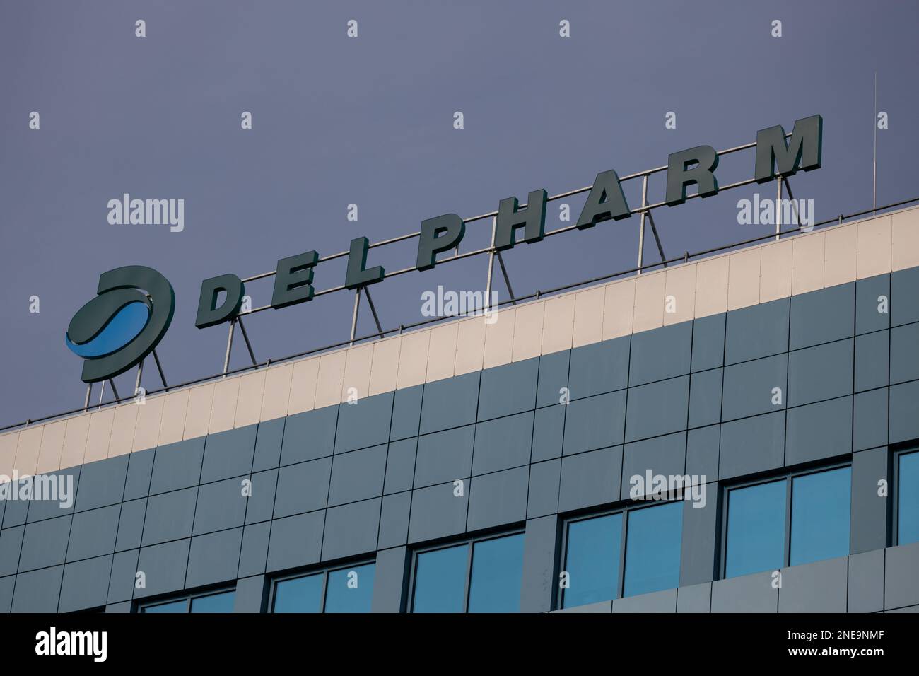 Poznan, Poland - February 16, 2023 : Logo of Delpharm Biologicals in Poland - Delpharm is a French pharmaceutical company. Stock Photo