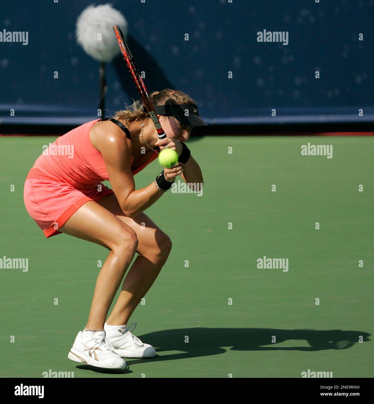 Israel's Shahar Peer returns the ball to Venus Williams of U.S. during