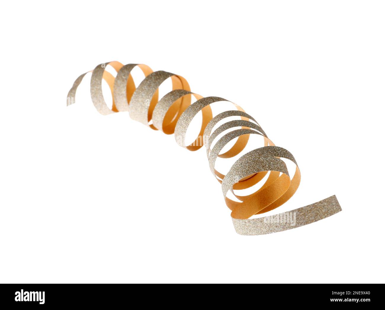Shiny serpentine streamer on white background. Festive decor Stock
